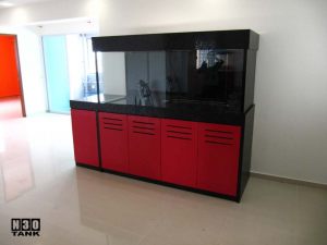 6ft-9 - Custom-made by N30 Singapore. Aquarium is encased in a Black Top and Bottom Red cabinet. Best of black/red combination. An extended cabinet serves as desktop space for keys, phones etc.