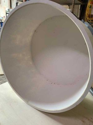 A large round fiberglass tank designed by N30 Tank.