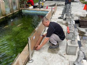 Pond Safety Work: Install stainless steel railing and thick acrylic panels.