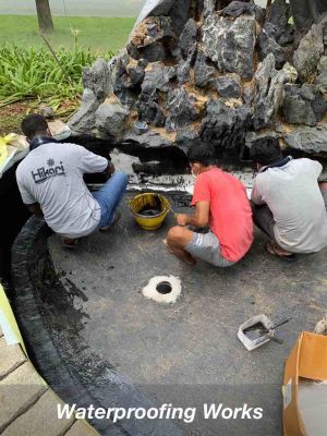 Special waterproof coating is applied to pond wall and bottom.